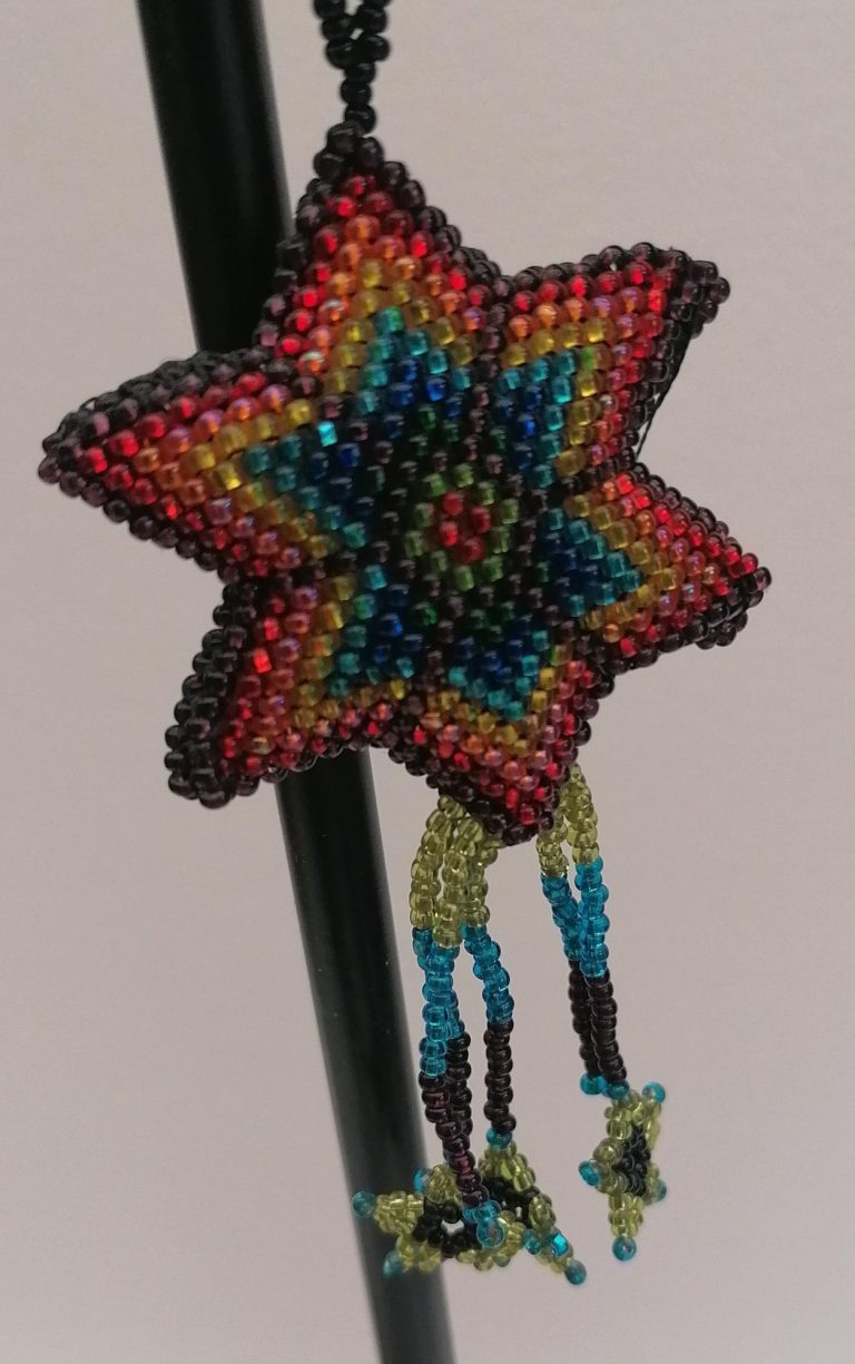 Red and multi coloured glass bead falling star decoration - £6 Red and multi coloured glass bead falling star decoration
