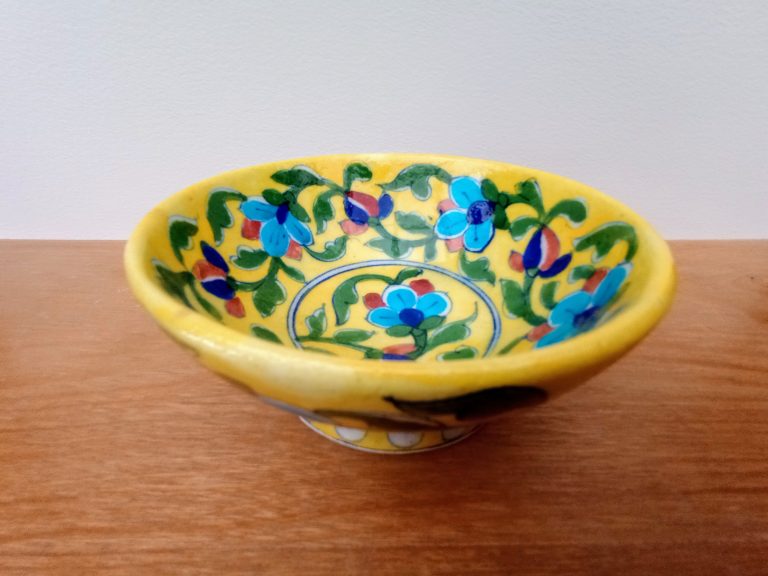 Yellow bowl with turquoise flower design - £12