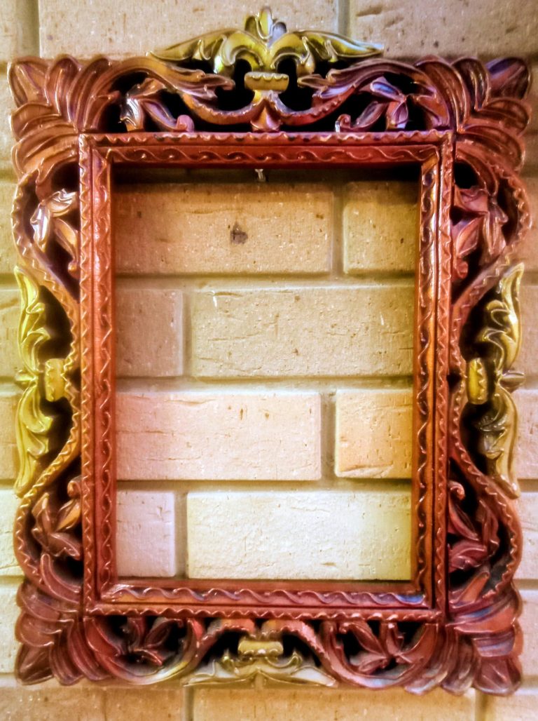 Carved wooden frame - £20
