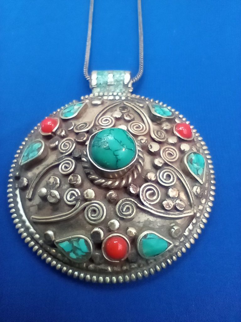 Circular pendant, antique silver finish - £20