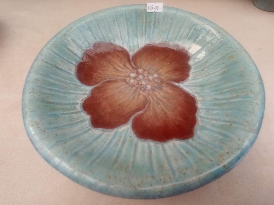 Blue dish with chocolate flower motif